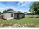 Picture of the private backyard showcasing the home's screened-in porch at 22824 Marsh Wren Dr, Land O Lakes, FL 34639