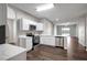 Bright kitchen with stainless steel appliances, white cabinetry, and modern finishes at 22824 Marsh Wren Dr, Land O Lakes, FL 34639