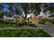 Charming home with well-manicured lawn and mature trees, offering great curb appeal and a welcoming ambiance at 2455 Anthony Ave, Clearwater, FL 33759