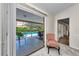 A patio is visible through sliding glass doors from inside the house at 2455 Anthony Ave, Clearwater, FL 33759