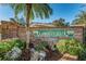 Entrance to Countrypark, a deed restricted community, with well maintained brick and colorful landscaping at 2455 Anthony Ave, Clearwater, FL 33759