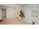 Spacious living room with tile flooring, neutral walls, and bright windows with blinds at 2926 Fairfield S Ave, St Petersburg, FL 33712