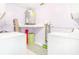 Practical laundry room equipped with washer, dryer, water heater, and ample storage at 3026 Cedaridge Dr, Tampa, FL 33618