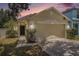 Charming single-story home with a neutral color palette, a two-car garage, and an inviting entrance at 3443 Fyfield Court, Land O Lakes, FL 34638