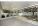 View of screened-in lanai and fenced backyard, perfect for outdoor living at 3443 Fyfield Court, Land O Lakes, FL 34638