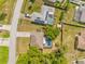 Aerial view of neighborhood showing proximity of houses with pools and solar panels at 3485 Dothan Ave, Spring Hill, FL 34609