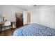 Inviting bedroom with a bed, a dresser with TV, and ample storage space at 3485 Dothan Ave, Spring Hill, FL 34609