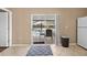 The bright eat-in kitchen offers tile flooring and access to the screened-in lanai with pool views at 3485 Dothan Ave, Spring Hill, FL 34609