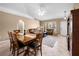 Inviting living room with tile flooring, comfortable seating, and arched doorways with natural light at 3485 Dothan Ave, Spring Hill, FL 34609
