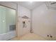 Utility room featuring washer-dryer hookups and shelving for efficient storage at 3529 Orion Rd, Spring Hill, FL 34606
