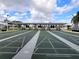 Outdoor shuffleboard courts with a covered seating area; perfect for community enjoyment at 3605 100Th N Ter, Pinellas Park, FL 33782