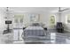 Expansive bedroom with exercise equipment, lounge chair, and serene backyard views at 3663 Berger Rd, Lutz, FL 33548
