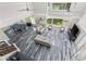 Open-concept living room with soaring ceilings, pool table, and abundant natural light at 3663 Berger Rd, Lutz, FL 33548