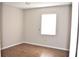 Bedroom featuring neutral paint and wood floors at 4702 Michael Ct # 139, Tampa, FL 33614
