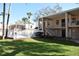 The condo complex boasts well-maintained grounds and a charming exterior, enhanced by lush landscaping at 4702 Michael Ct # 139, Tampa, FL 33614