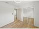 Bedroom features hardwood floors, ample space, and closet with mirrored doors at 4704 W Fairview Hts, Tampa, FL 33616