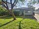 Charming single story home with well-maintained lawn and mature landscaping creates curb appeal at 507 Danube Ave, Tampa, FL 33606
