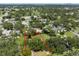 Great aerial view of a buildable lot in a neighborhood with mature trees and nearby homes at 5391 54Th N St, St Petersburg, FL 33709