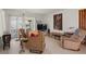 A casual living room with two plush armchairs and natural light at 5391 54Th N St, St Petersburg, FL 33709