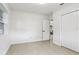 Spacious bedroom with light flooring, neutral walls, and ample closet space at 6 N Orion Ave, Clearwater, FL 33765