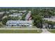 Aerial view showcases the neighborhood and the property's ideal location, near green space at 6601 121St Ave # I, Largo, FL 33773