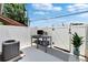 Backyard patio area featuring an outdoor grill, cooking equipment, and outdoor decor at 6601 121St Ave # I, Largo, FL 33773