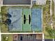 Aerial showcases community basketball courts, perfect for recreation and friendly competition at 6601 121St Ave # I, Largo, FL 33773