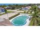 Capture the essence of resort-style living with this sparkling community pool and surrounding amenities at 6601 121St Ave # I, Largo, FL 33773