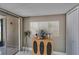 Cozy living space is accentuated by a decorative buffet and view to the sliding glass door at 6601 121St Ave # I, Largo, FL 33773