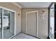 Enclosed porch with sliding glass doors to a residential home at 6601 121St Ave # I, Largo, FL 33773