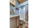 Bathroom featuring a shower-tub combo and classic vanity with a shower curtain at 6648 Castle Green Pl, Zephyrhills, FL 33541