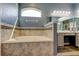 Beautiful bathroom features a tub with tan tile and vanity with plenty of counter space at 6648 Castle Green Pl, Zephyrhills, FL 33541