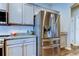 This kitchen features granite countertops and stainless steel appliances at 6648 Castle Green Pl, Zephyrhills, FL 33541