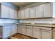 This kitchen features granite countertops and subway tile backsplash at 6648 Castle Green Pl, Zephyrhills, FL 33541