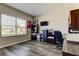 Functional office space with large window and plenty of room for storage and working from home at 6648 Castle Green Pl, Zephyrhills, FL 33541