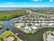 Panoramic aerial of the waterfront community showing picturesque canals, stunning homes, and beautiful coastal views at 718 Pinckney Dr, Apollo Beach, FL 33572