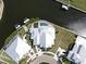 Stunning aerial view of home with pool, trampoline, private boat dock, and lush landscaping at 718 Pinckney Dr, Apollo Beach, FL 33572