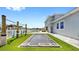 Entertain in this beautiful backyard with pool, in-ground trampoline, and outdoor gym at 718 Pinckney Dr, Apollo Beach, FL 33572