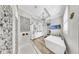 Luxury bathroom with a stylish shower, soaking tub, double vanity, and modern finishes at 718 Pinckney Dr, Apollo Beach, FL 33572