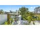 Private dock with a boat lift and waterfront access at 718 Pinckney Dr, Apollo Beach, FL 33572