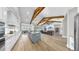 Spacious open-concept living space featuring a gourmet kitchen, cozy living room, and inviting dining area at 718 Pinckney Dr, Apollo Beach, FL 33572