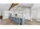 Beautiful kitchen with stainless steel appliances, vaulted ceilings and a large kitchen island with seating at 718 Pinckney Dr, Apollo Beach, FL 33572
