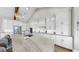 Elegant kitchen island with stone countertop and stainless steel appliances, blending style and functionality at 718 Pinckney Dr, Apollo Beach, FL 33572