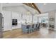 Open kitchen with stainless steel appliances, a large island, a dining area and plenty of cabinet space at 718 Pinckney Dr, Apollo Beach, FL 33572