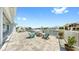 Patio area with comfortable seating around a fire pit, with a beautiful yard at 718 Pinckney Dr, Apollo Beach, FL 33572
