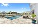 This gorgeous pool has a waterfront view and comfortable lounge seating at 718 Pinckney Dr, Apollo Beach, FL 33572