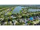 A stunning aerial view of the community near a lake at 7711 Nottinghill Sky Dr, Apollo Beach, FL 33572