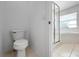 Bathroom featuring a corner bathtub and separate shower stall with glass doors at 7711 Nottinghill Sky Dr, Apollo Beach, FL 33572