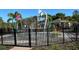 Community splash pad with decorative flower-shaped water features at 7711 Nottinghill Sky Dr, Apollo Beach, FL 33572