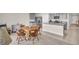 Eat in kitchen with gray cabinets, granite countertops, and stainless steel appliances at 7774 Sail Clover Ln, Zephyrhills, FL 33540